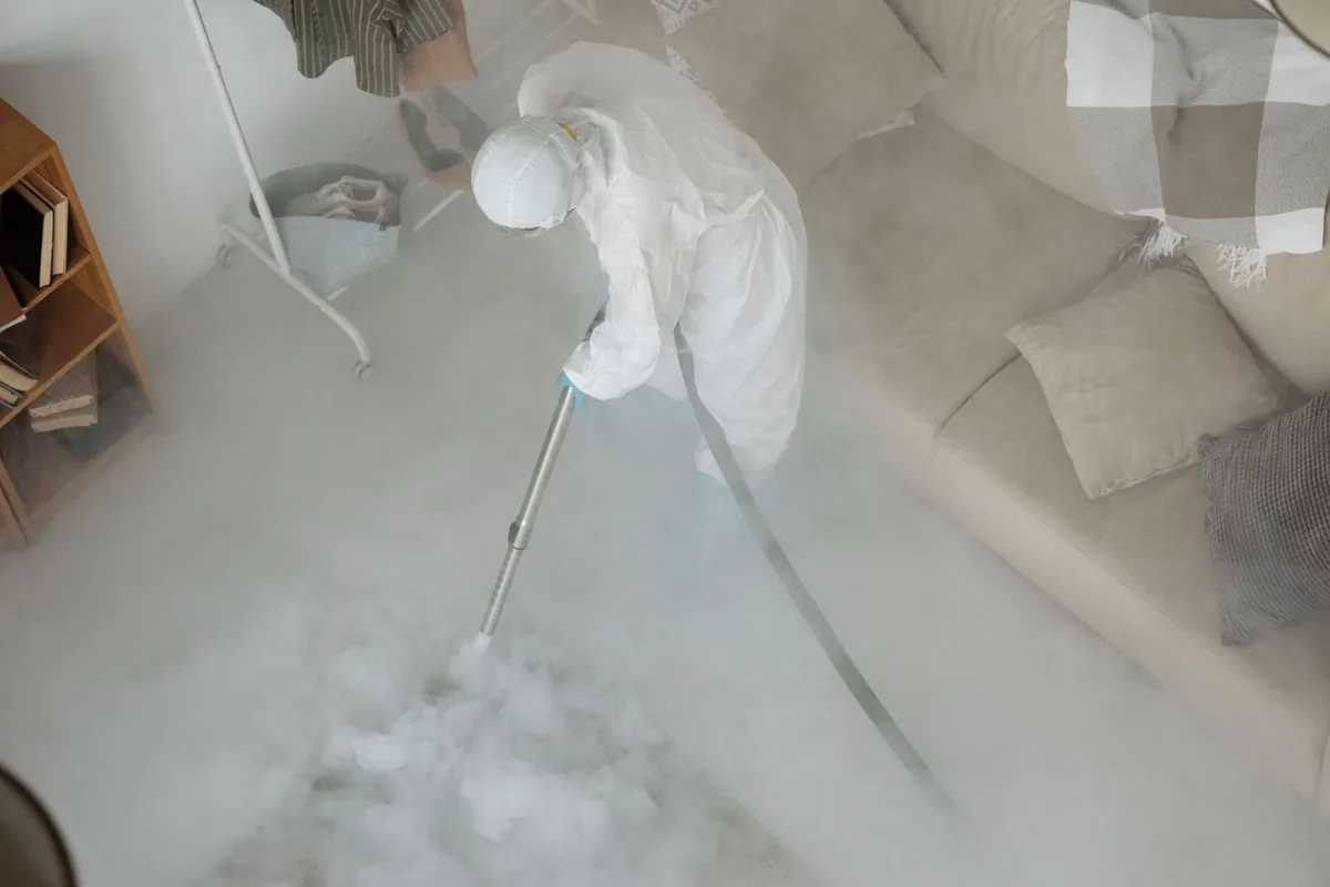 Biohazard cleanup technician in protective equipment, Mirrormont, WA